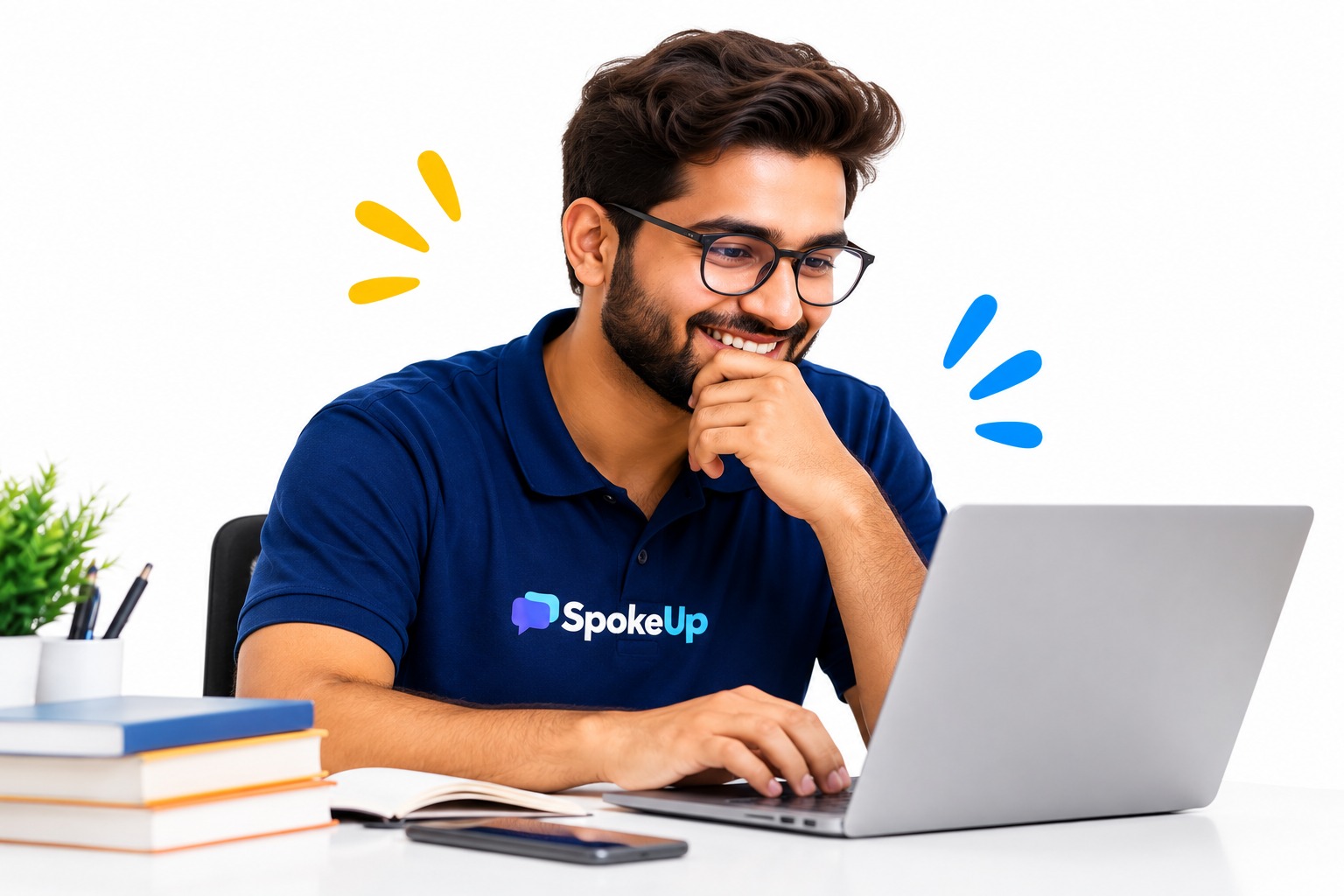 Smiling young professional on a laptop, improving communication skills for career with SpokeUp